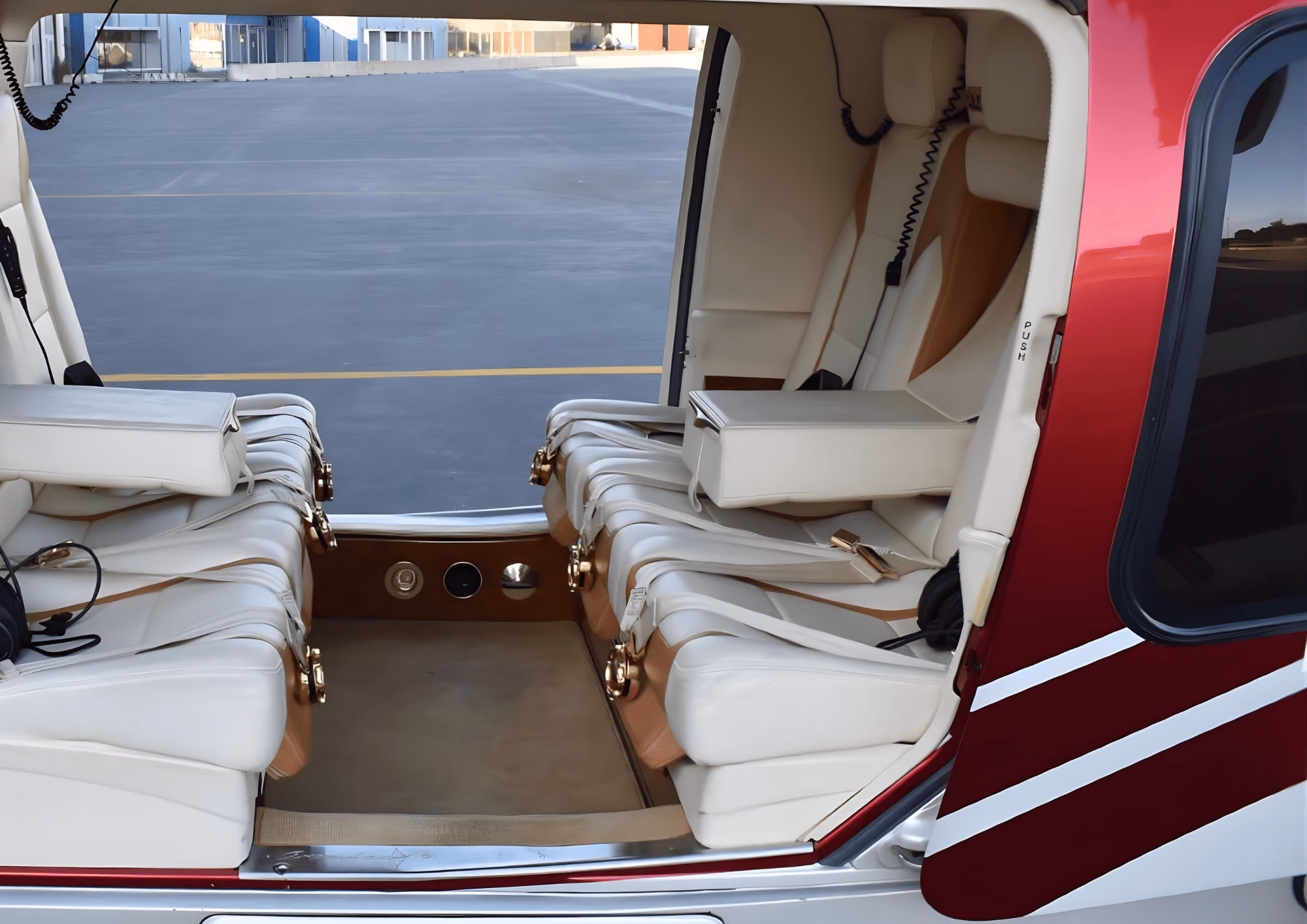 Premium cabin of the Leonardo A109SP helicopter with elegant passenger seating
