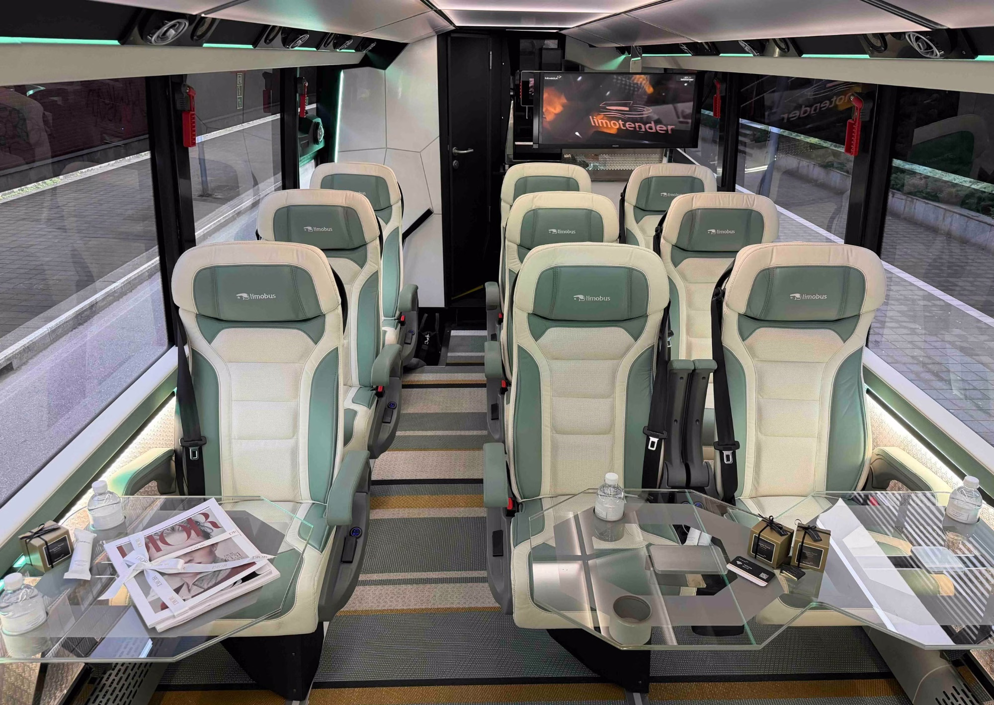 Interior table setup inside the Moveolux Limobus Seabreeze 18 for VIP group hospitality