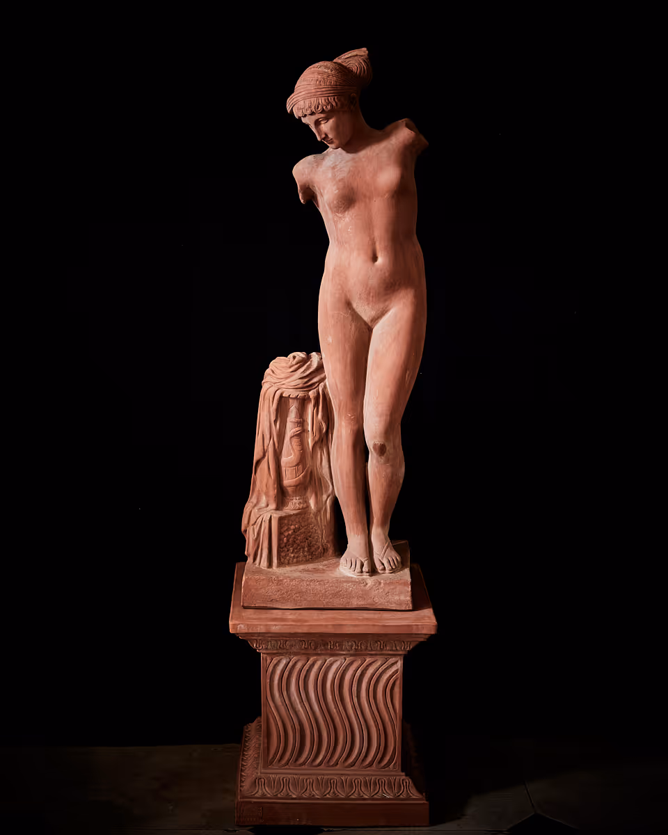 Defined by its classical contrapposto stance, the Venere Esquilina balances ancient divine power with the supreme mastery of Impruneta terracotta.