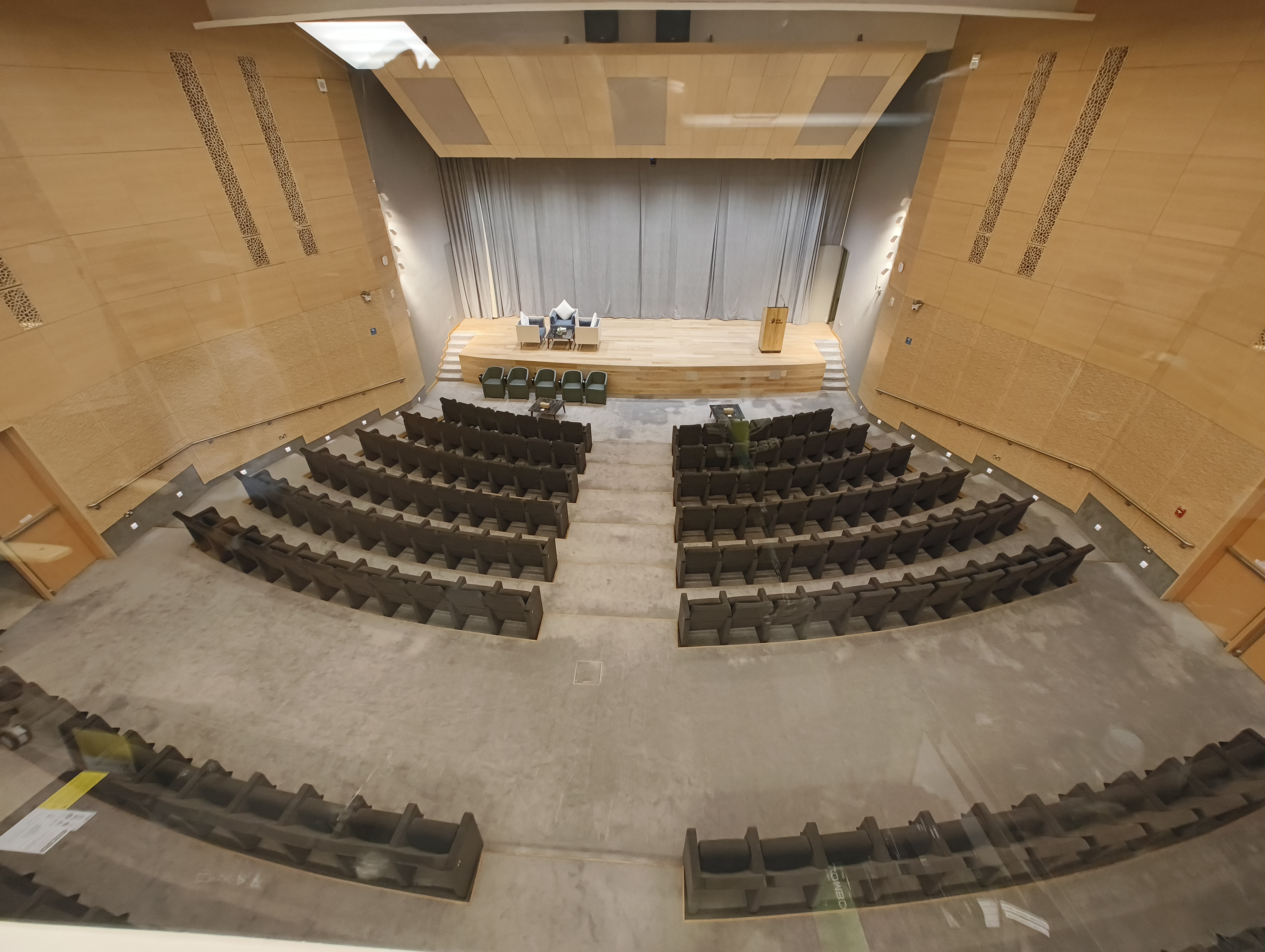 Auditorium screen and seating AV installation by Technobriq