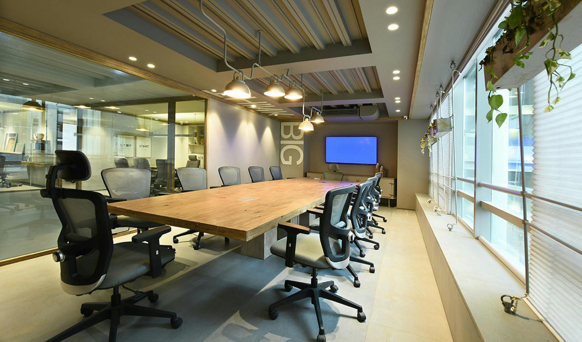Conference room AV system integration installed by Technobriq for QatarEnergy VIP boardroom, Doha