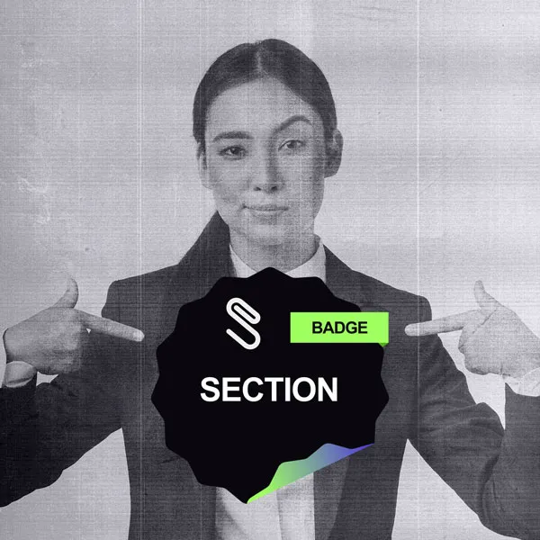 woman pointing to her badge