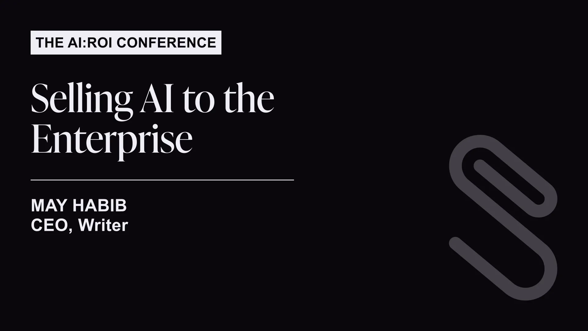 Text slide for The AI:ROI Conference titled 'Selling AI to the Enterprise' by May Habib, CEO and writer, with a paperclip icon on the right.
