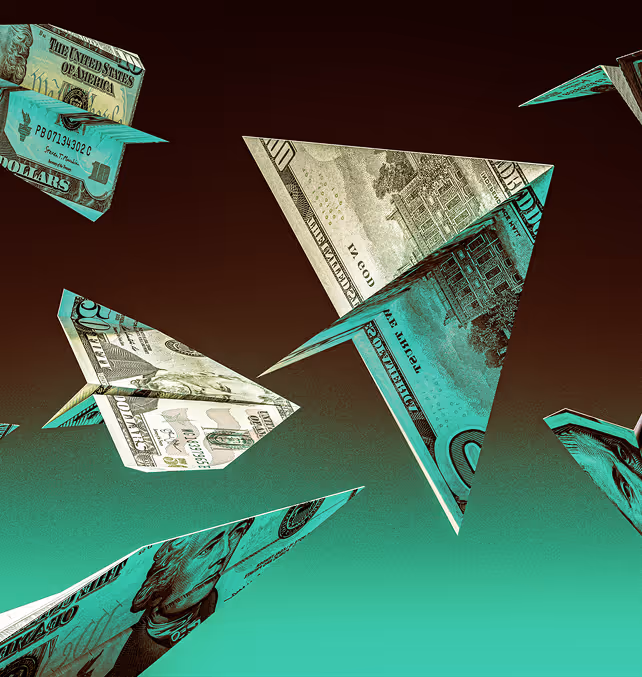 Multiple origami paper planes folded from U.S. dollar bills flying against a gradient brown to green background.