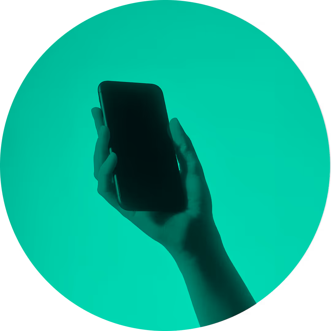 Hand holding a smartphone against a bright teal background.