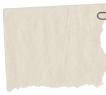 A torn piece of textured beige paper with a paperclip attached at the top right corner.
