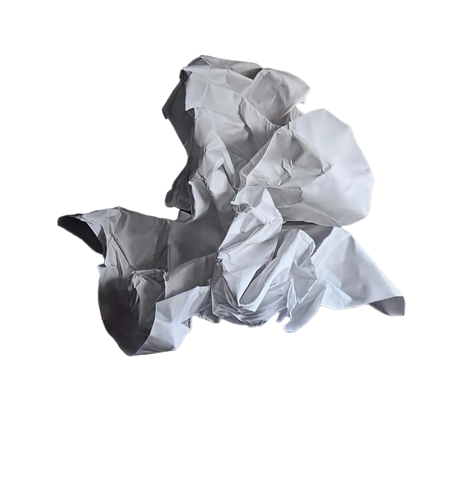 Crumpled white paper ball on a black background.