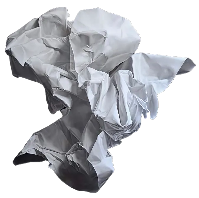 Crumpled white paper sheet isolated on black background.