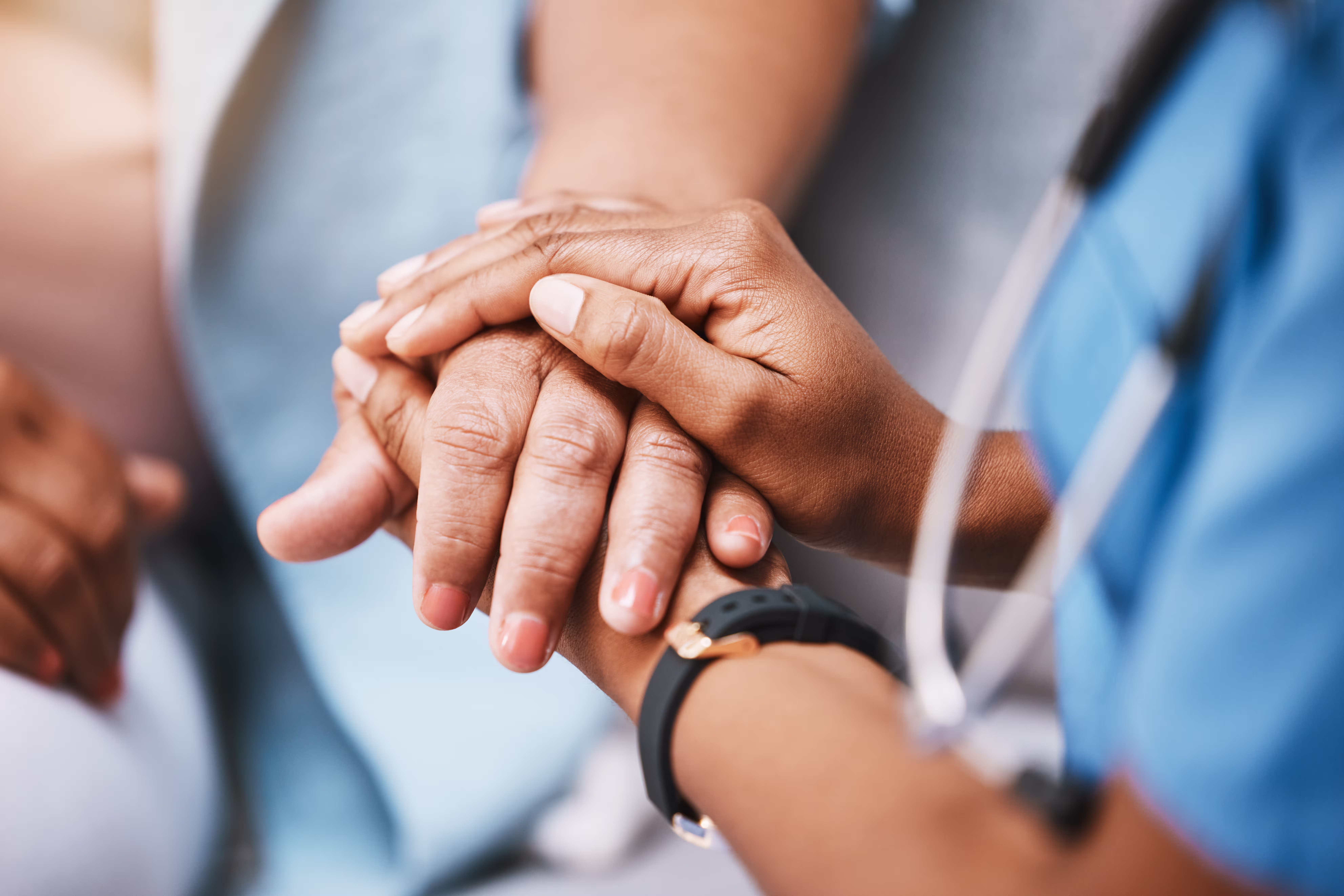 medical care holding hand