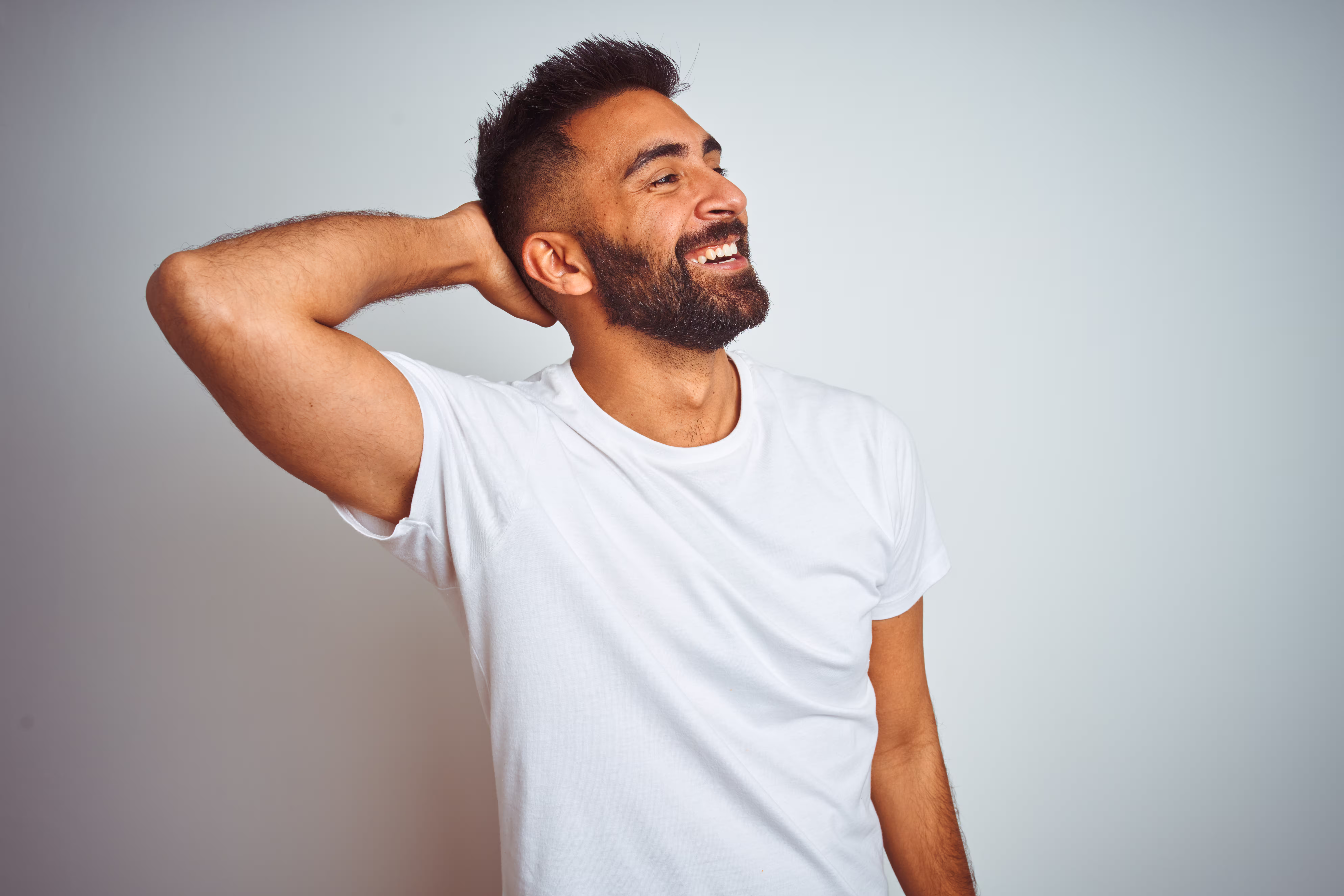 man touching head