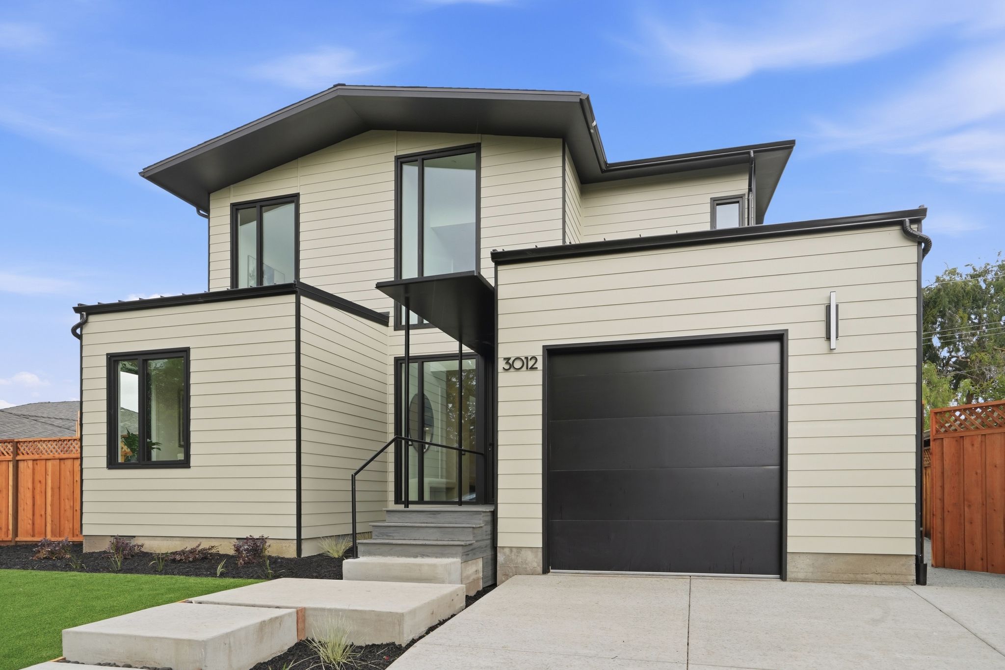 12 Maywood Ln exterior (representative photo, 1-car garage)
