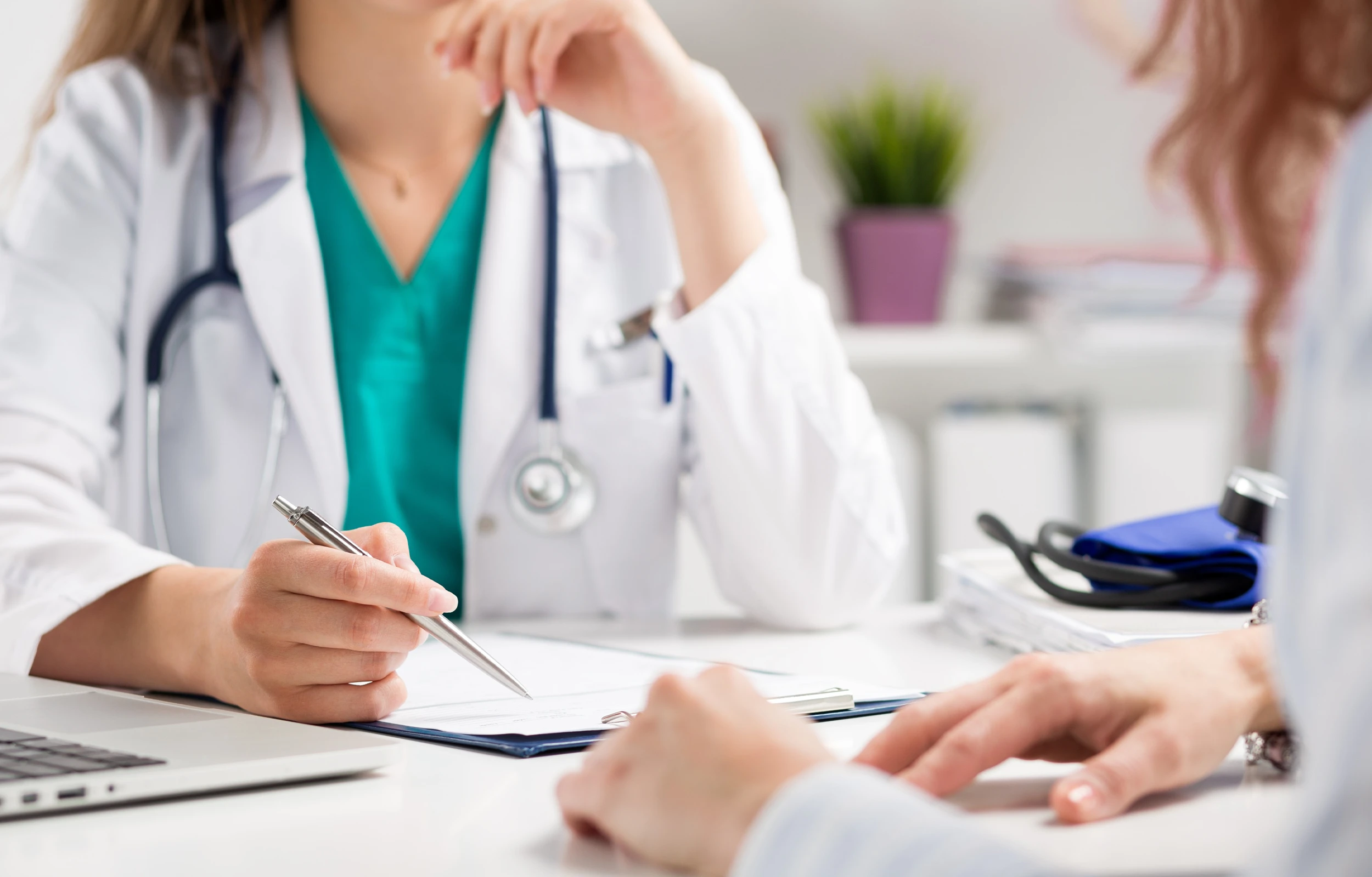 A doctor talking to a patient