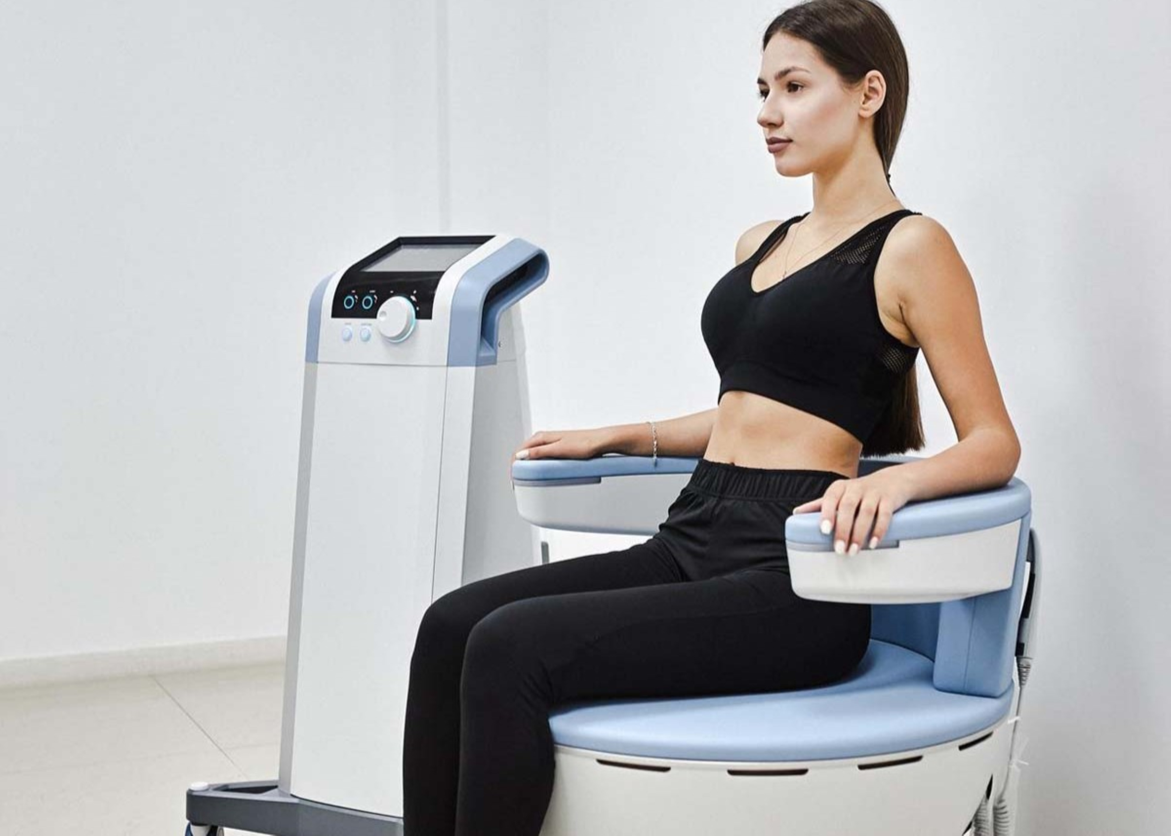 A woman getting Emsella done