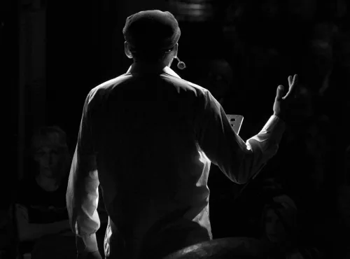 Public speaker talking on stage