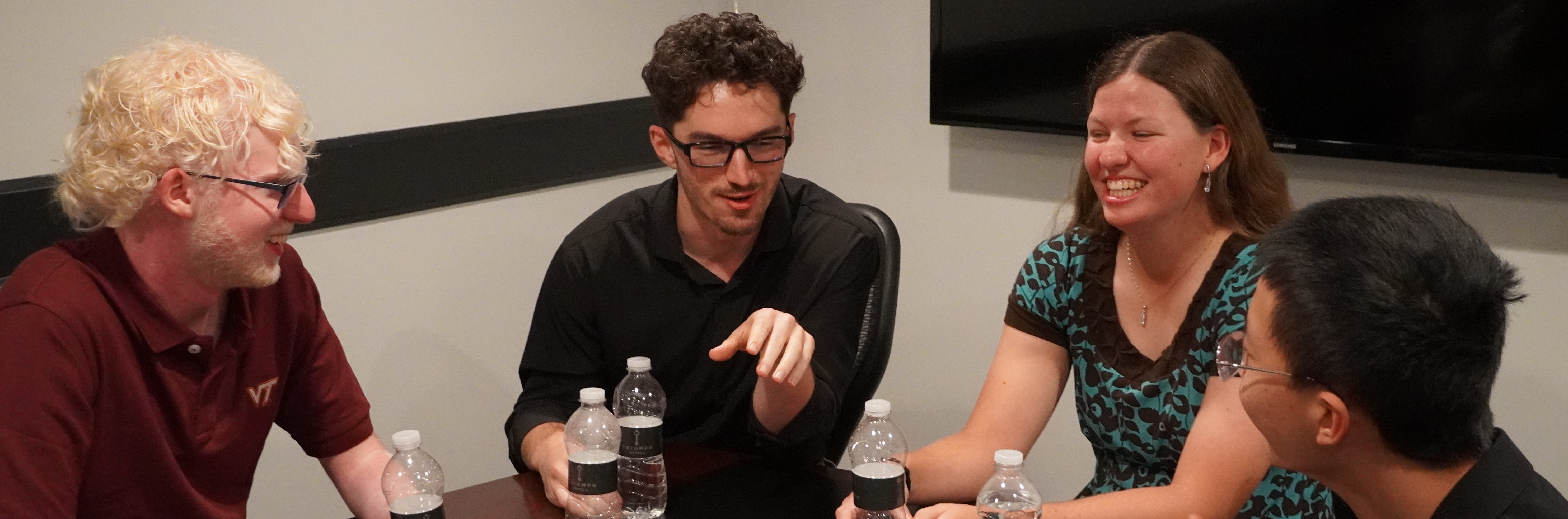 A small group of 2026 TSP Scholars in lively conversation