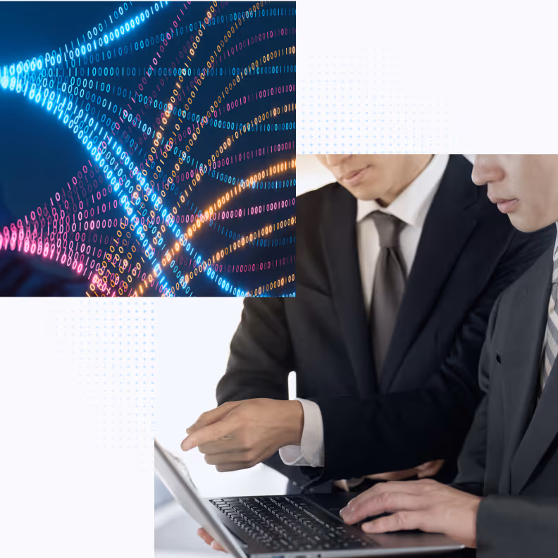 Two men in suits working on a laptop, with digital binary code overlay in blue, pink, and orange.