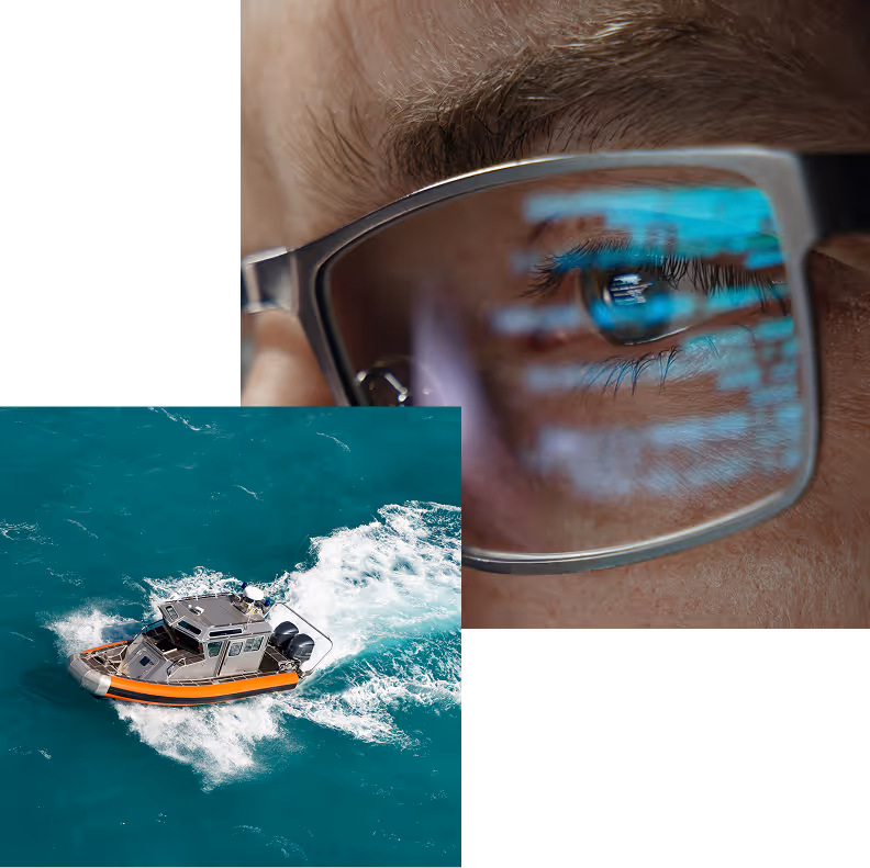 Close-up of an eye behind glasses reflecting code, with a small orange and gray speedboat on blue water below.