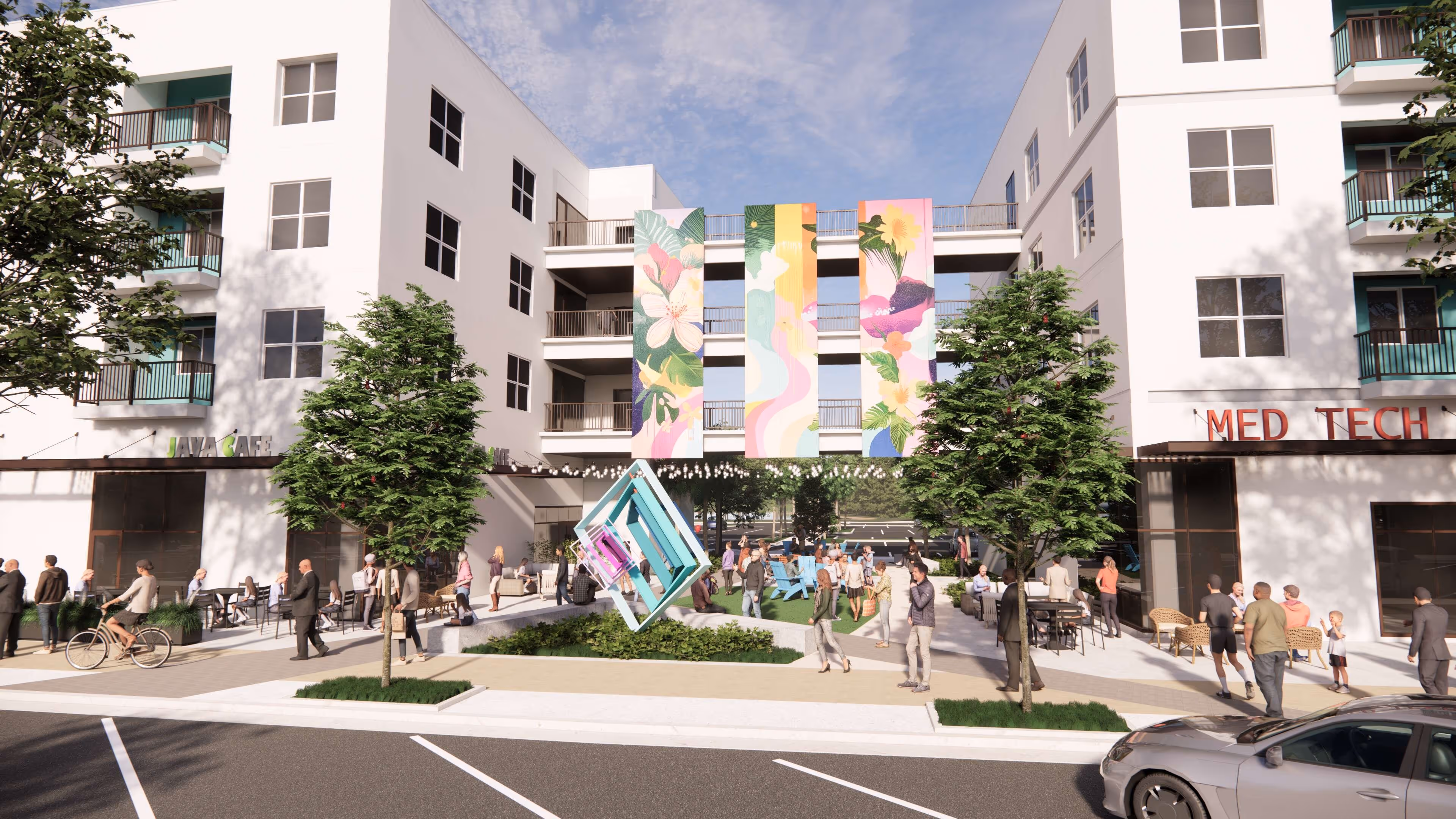 A rendering of some of the six buildings of The Promenade at Town Center, with shops on the first floor and small apartments above.