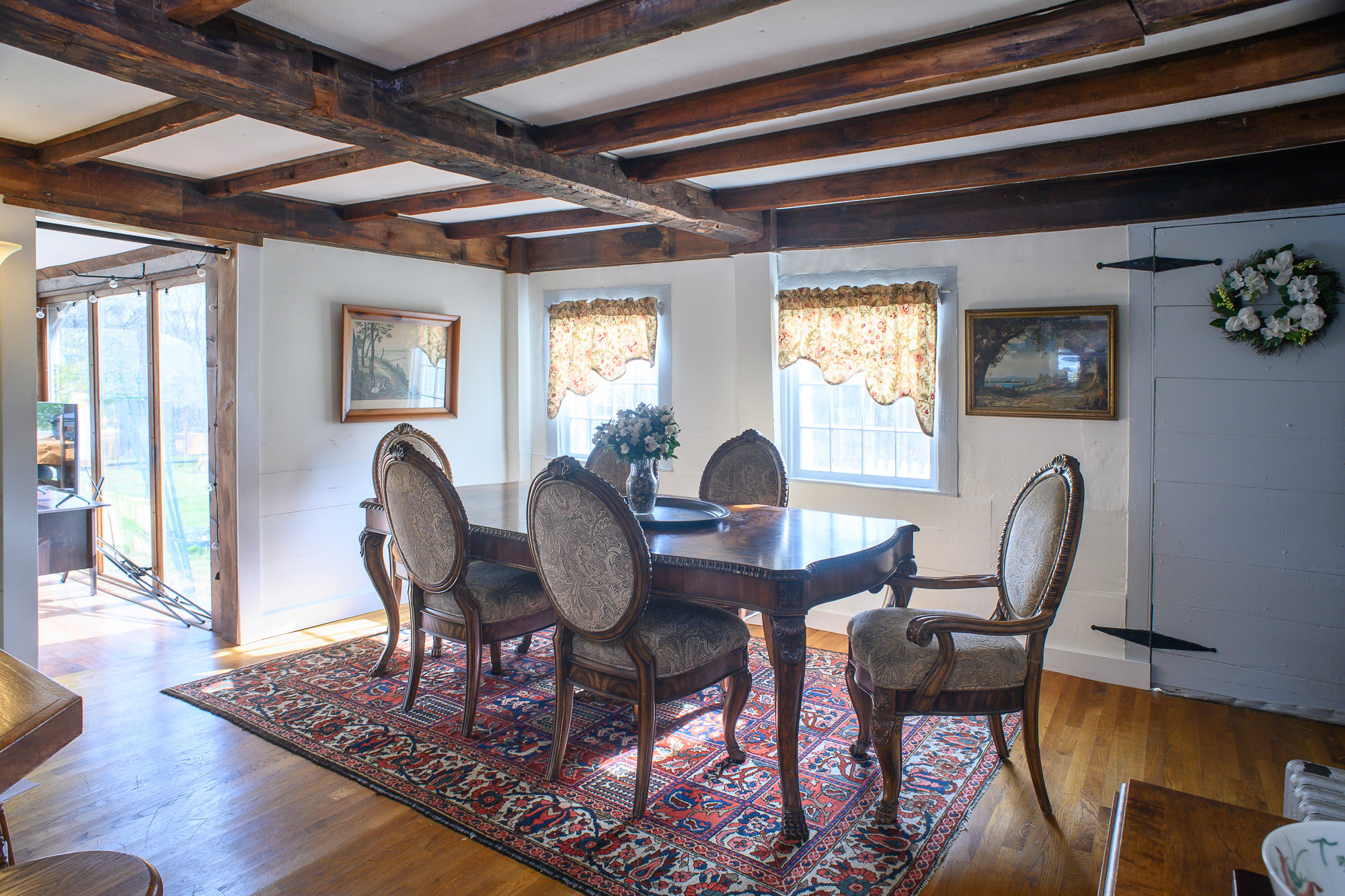 Gather 'round our antique dinner table to enjoy a delicious feast