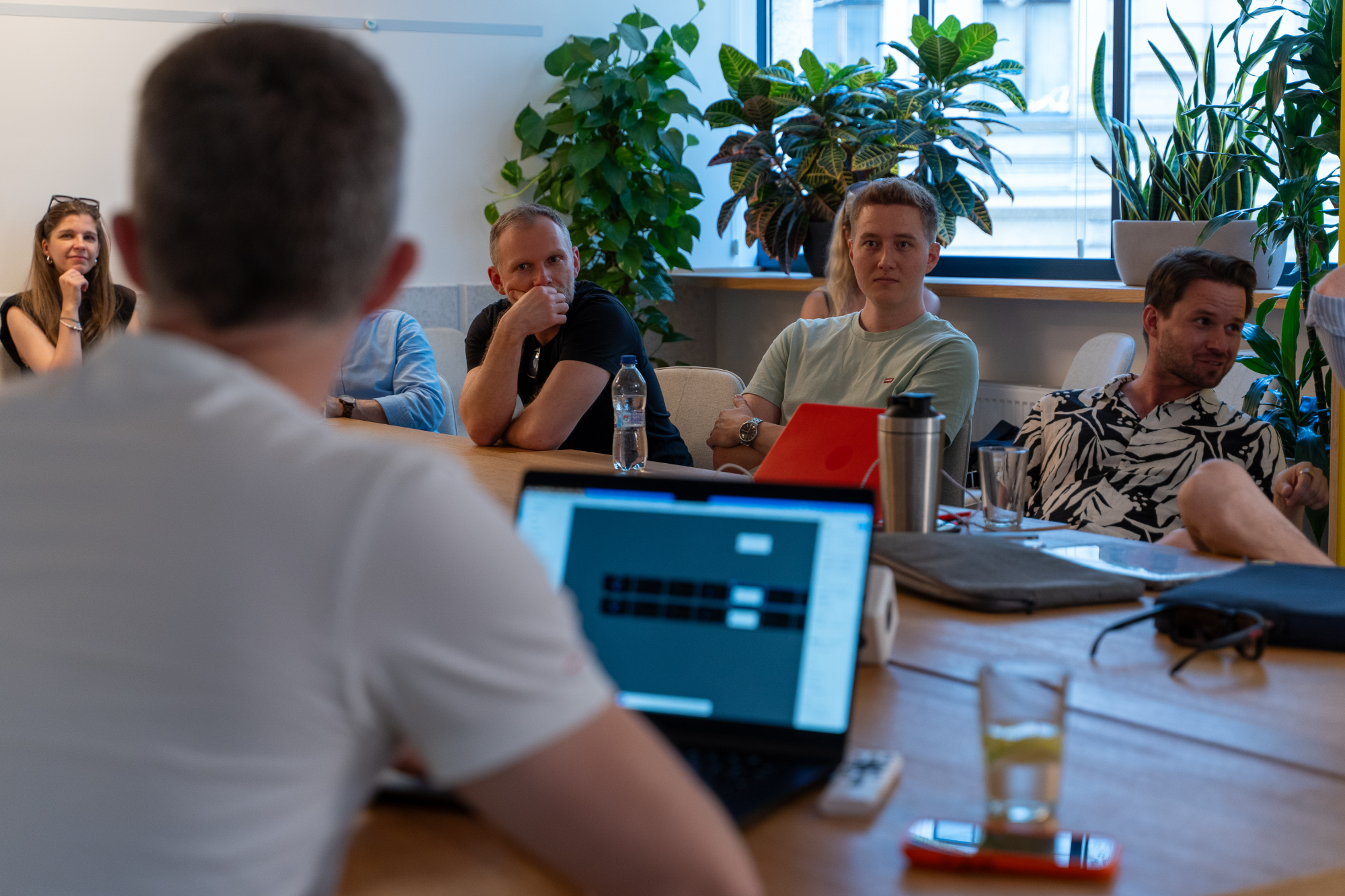 People listening to Hunor's presentation.