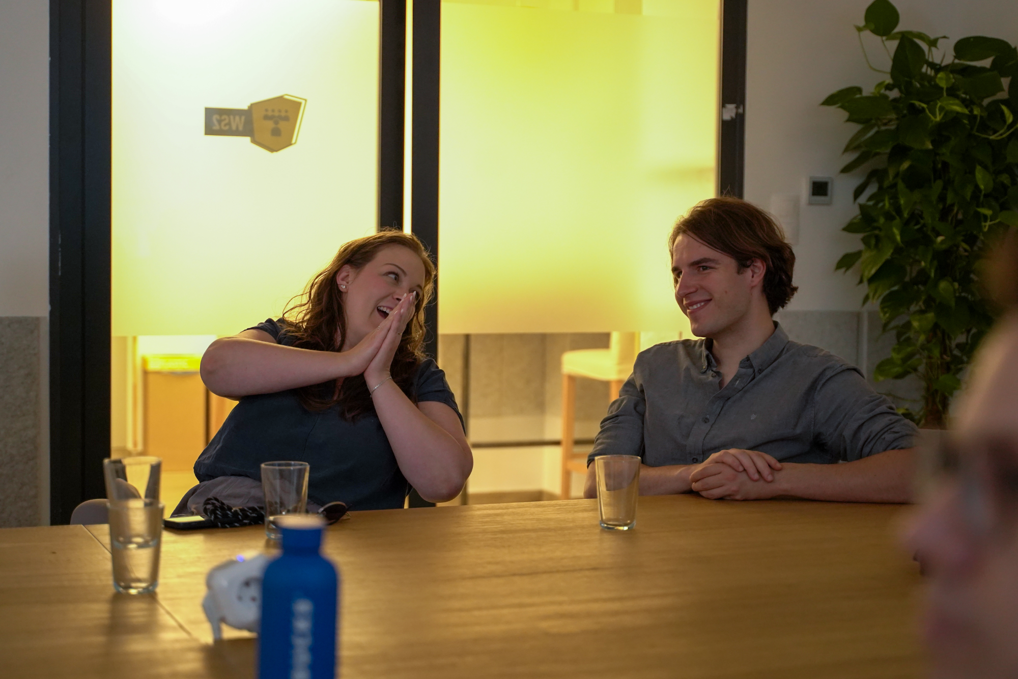 People laughing joyfully.