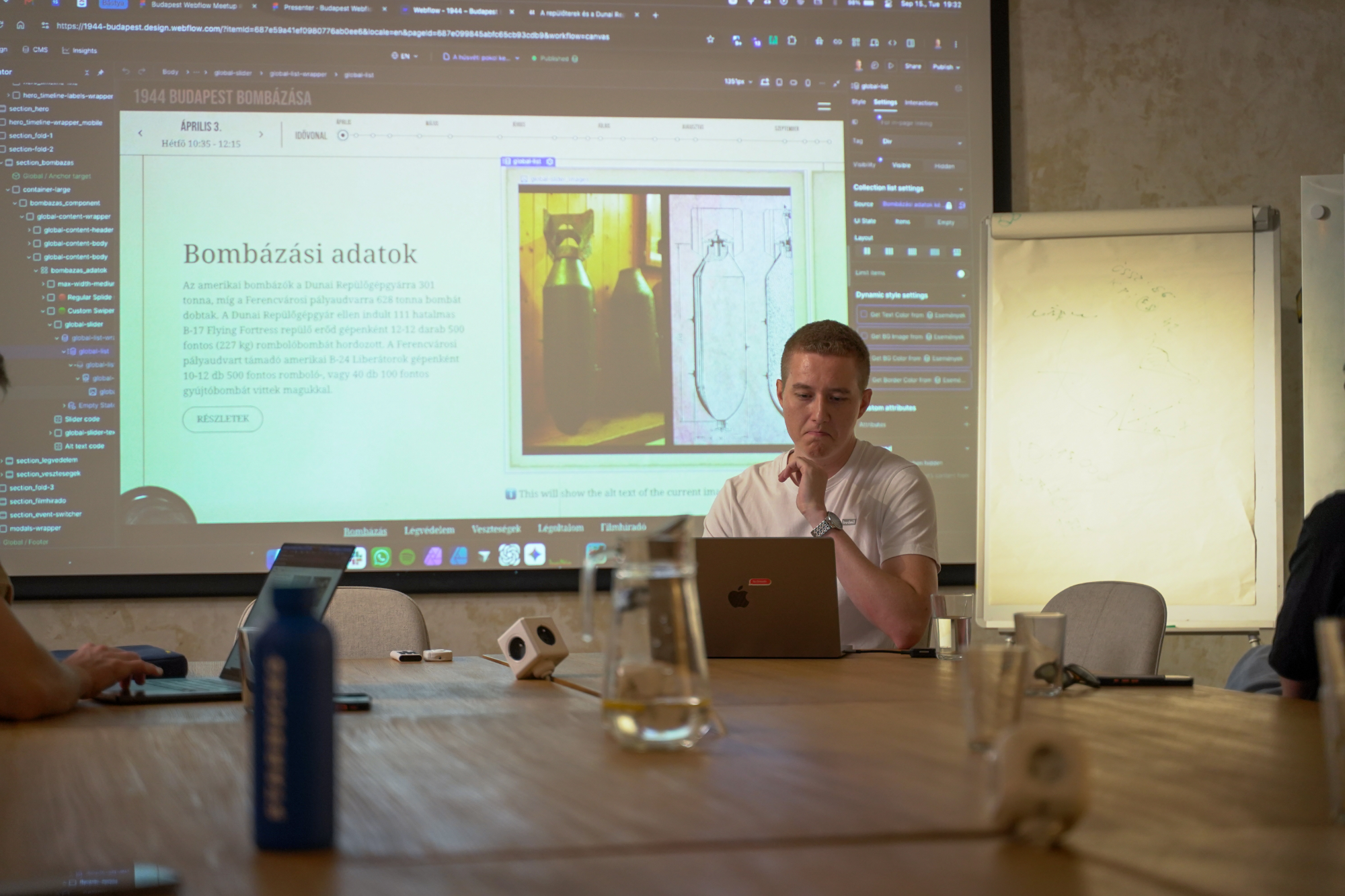 Person presenting web development details.