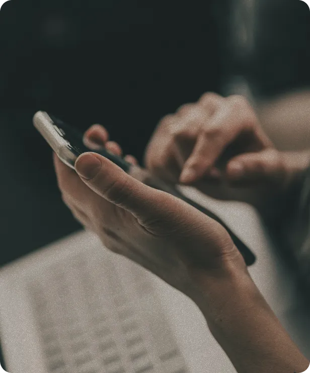 Man typing on the phone