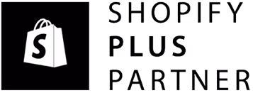 Badge officiel Shopify Plus Partner certifié, agence Artich.io spécialisée Shopify B2C, B2B et POS