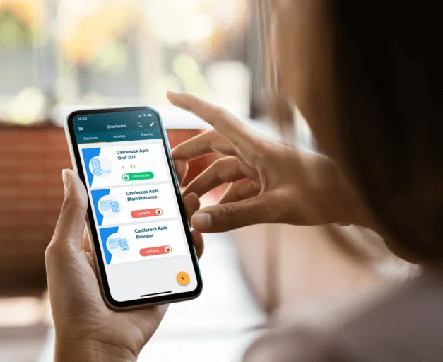 Woman uses RemoteLock App on her smartphone.