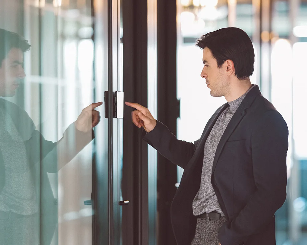 Man uses reservation system for conference room