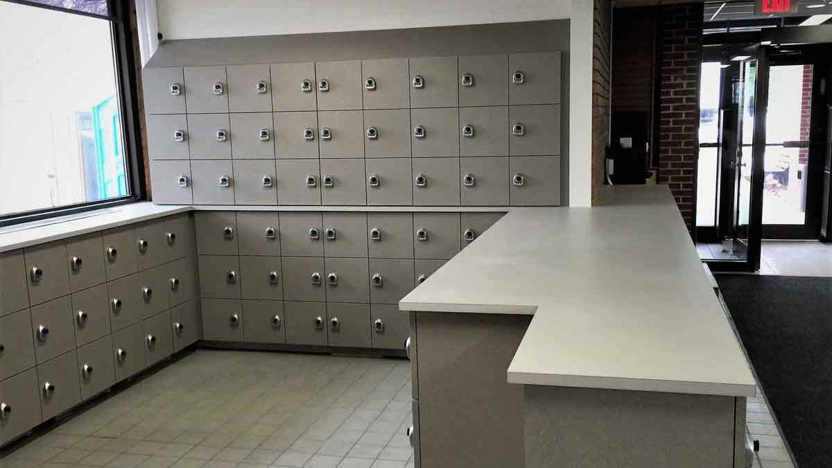 An image of a mail cubbies at the USPS office.