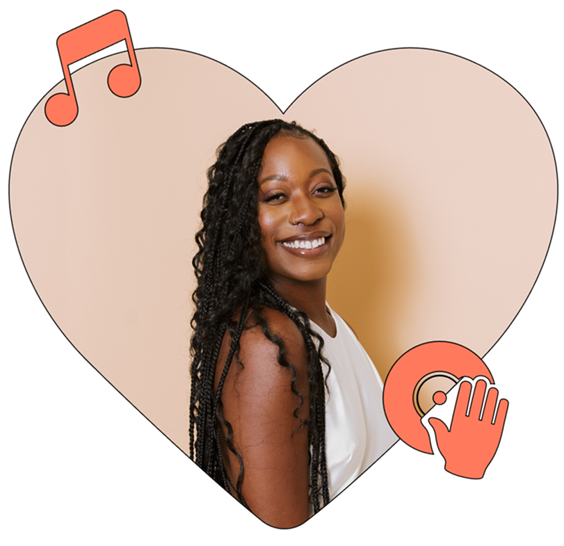 Ebb, in a white dress, smiling.