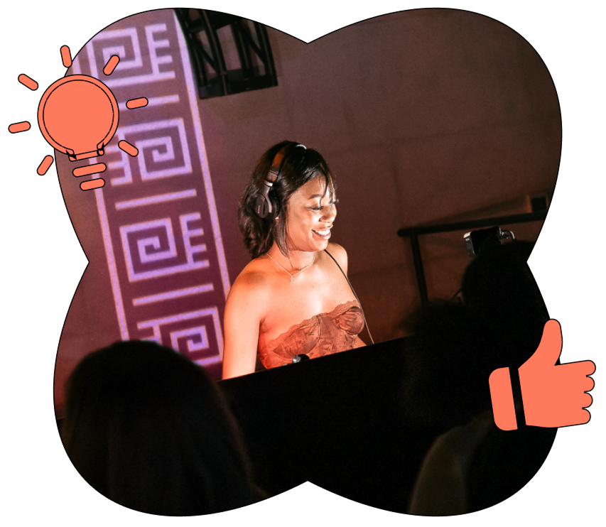 Ebb DJing at a large music venue.