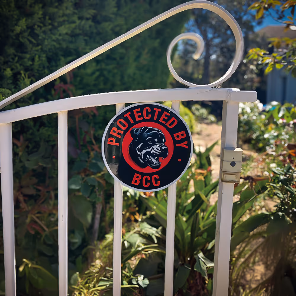 Two people discussing and pointing at a document on a clipboard during a meeting.