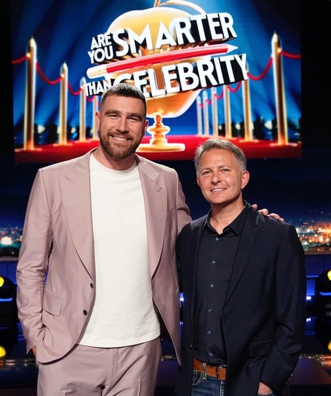 Barry with Travis Kelce on set