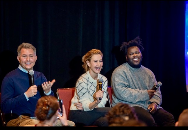 Barry moderating panel discussion