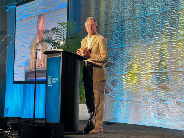 Barry Poznick accepting award at RealScreen