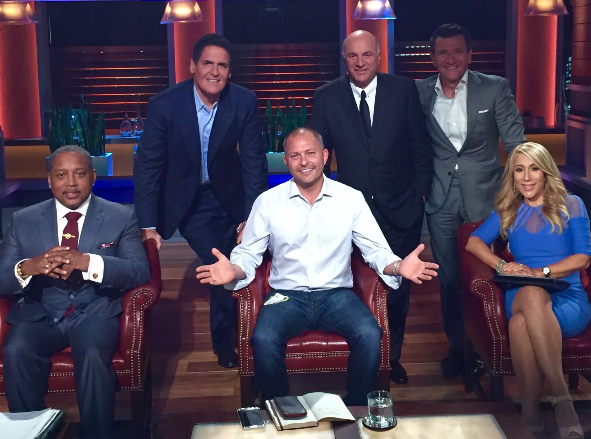 Barry Poznick with the Sharks on the set of Shark Tank