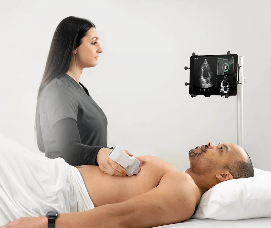Image of healthcare professional and patient during a scan
