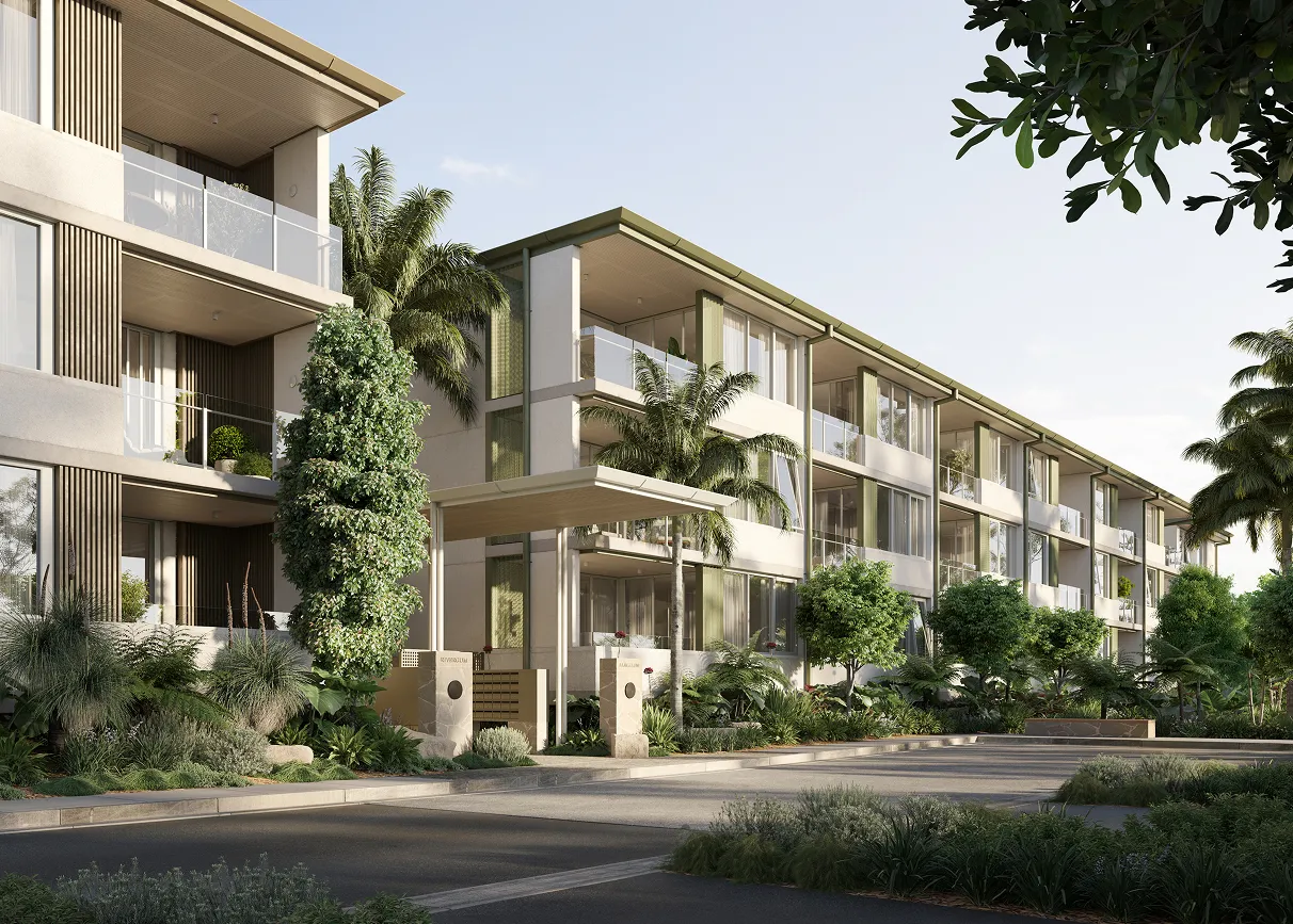 Modern balcony dining area with six black cushioned chairs and an oval table decorated with a vase of green plants and a plate of green apples, overlooking a scenic tree-filled landscape.