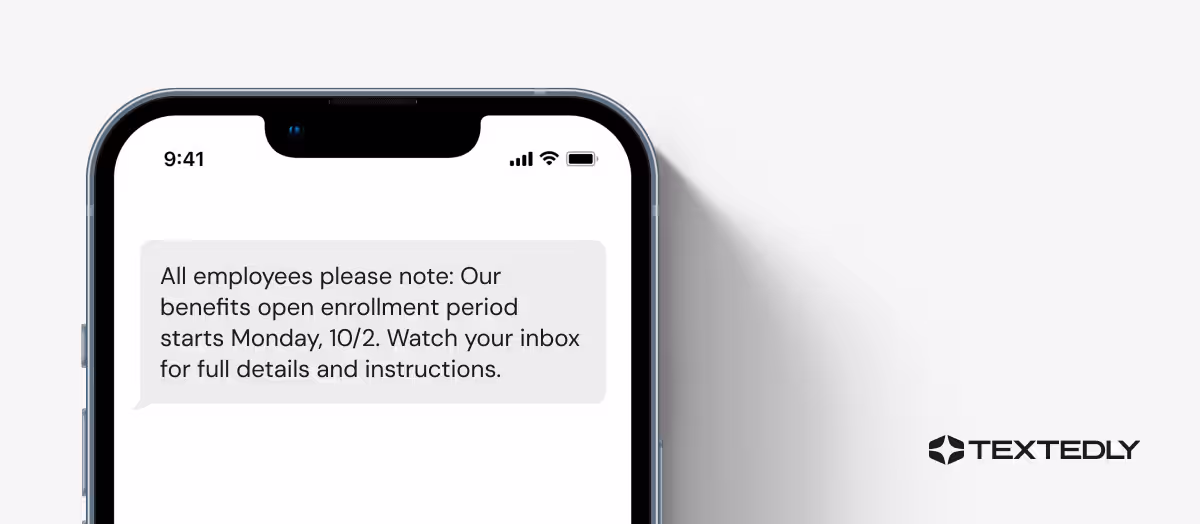 Company-wide SMS announcing open enrollment.