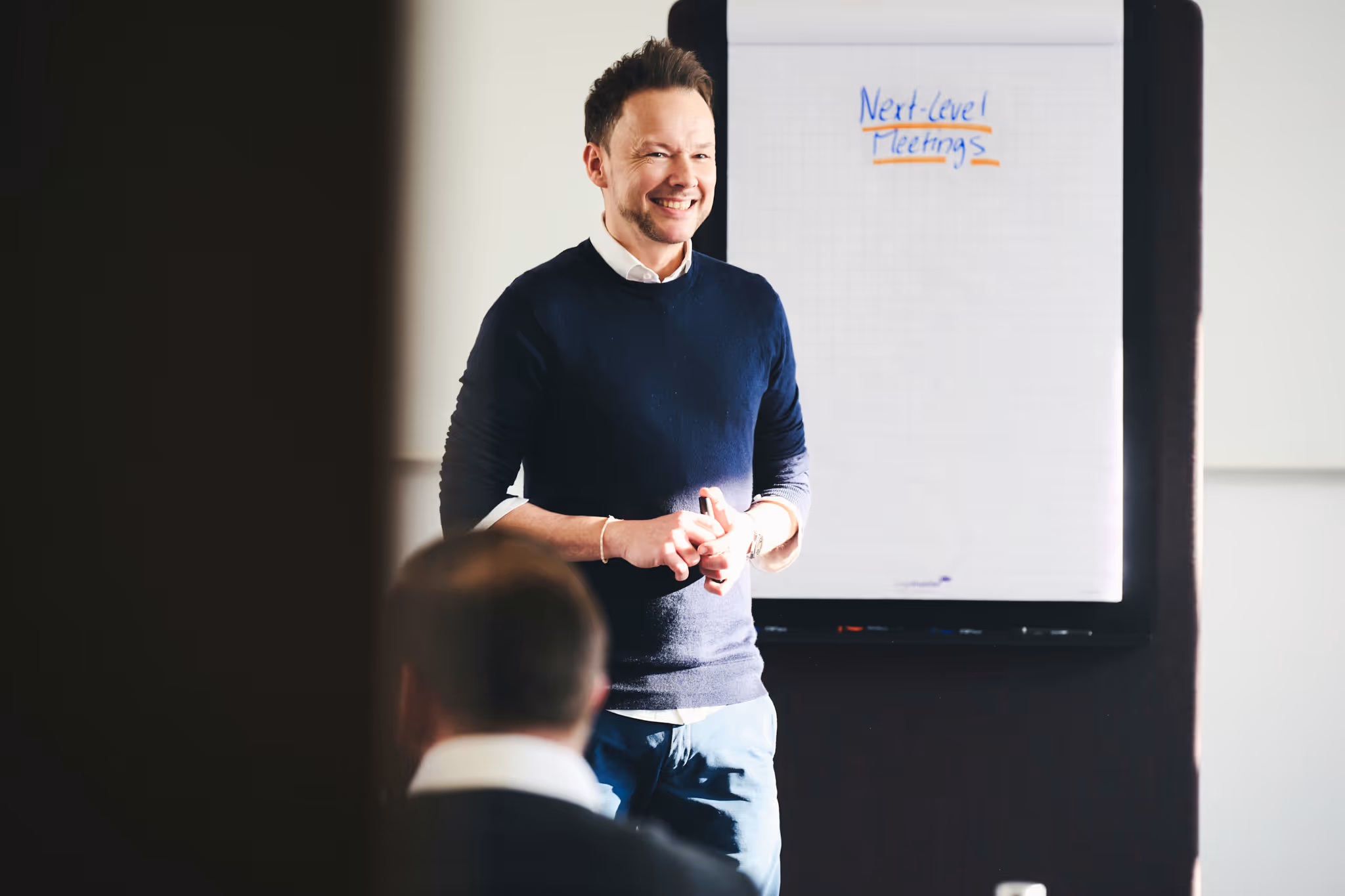 Modern sales training session focused on improving sales conversations beyond product knowledge