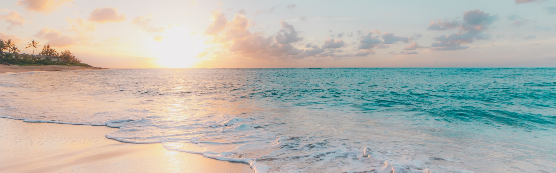 Calm beach at sunset