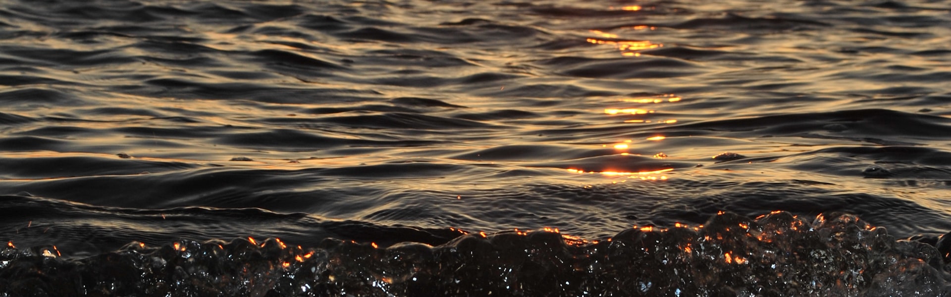 Boardwalk toward calm horizon
