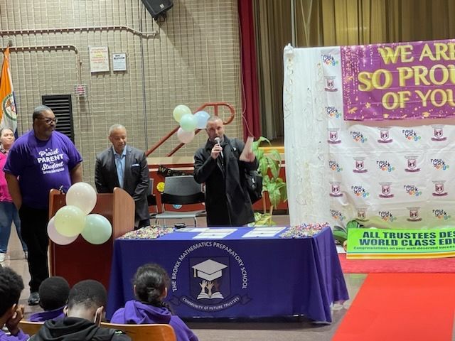 Speaker addresses students at Bronx Mathematics Preparatory School ceremony