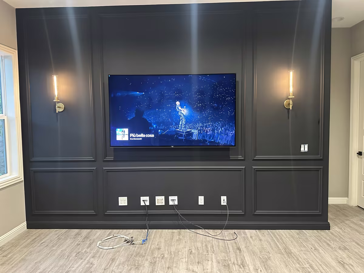 Navy board and batten accent wall in Orange County media room