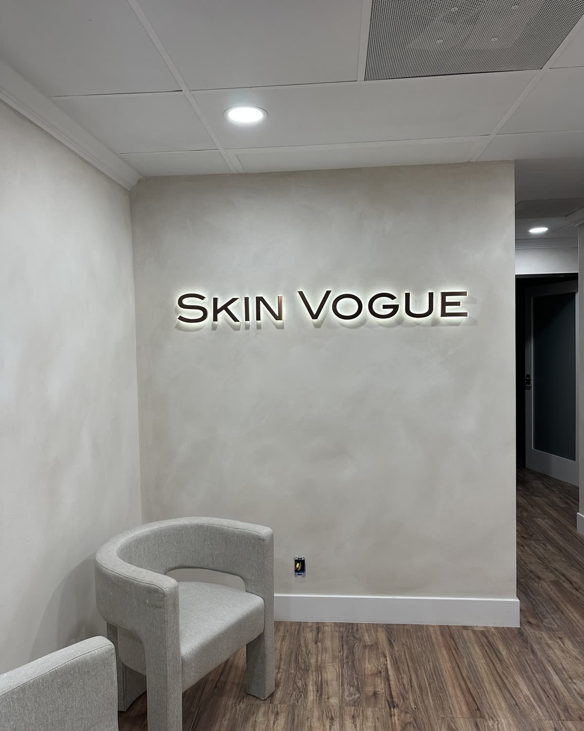 Hand applied limewash on a reception wall, Orange County