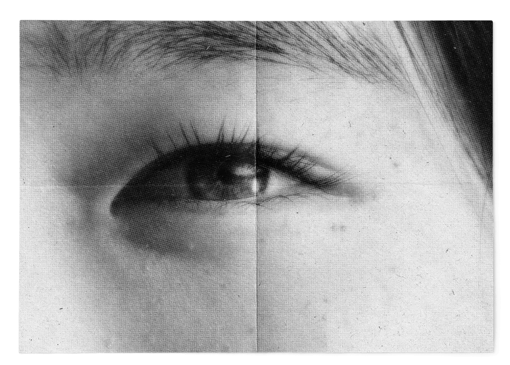 Black and white close-up of a woman's eye.