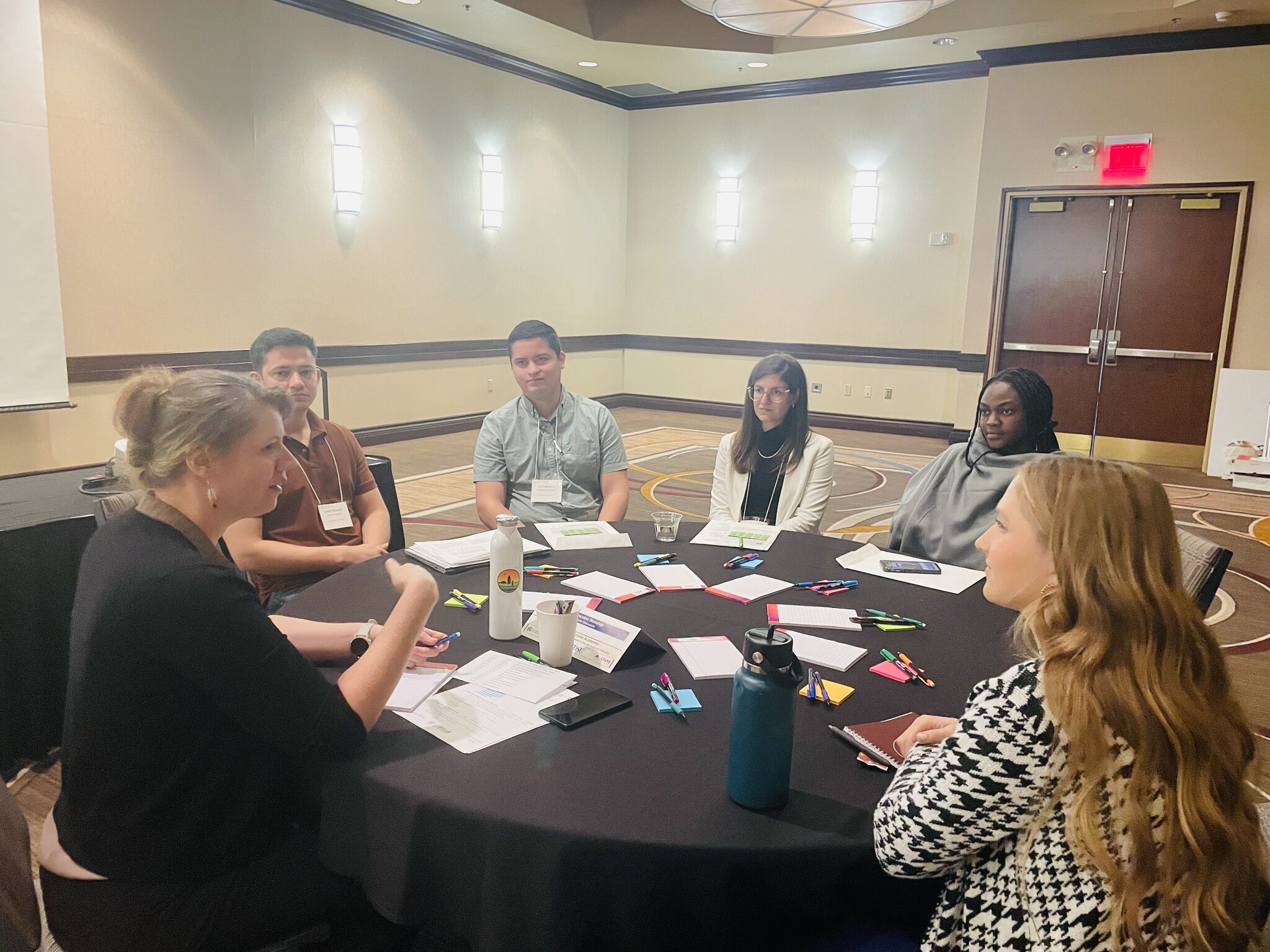 Participants working together at a round table