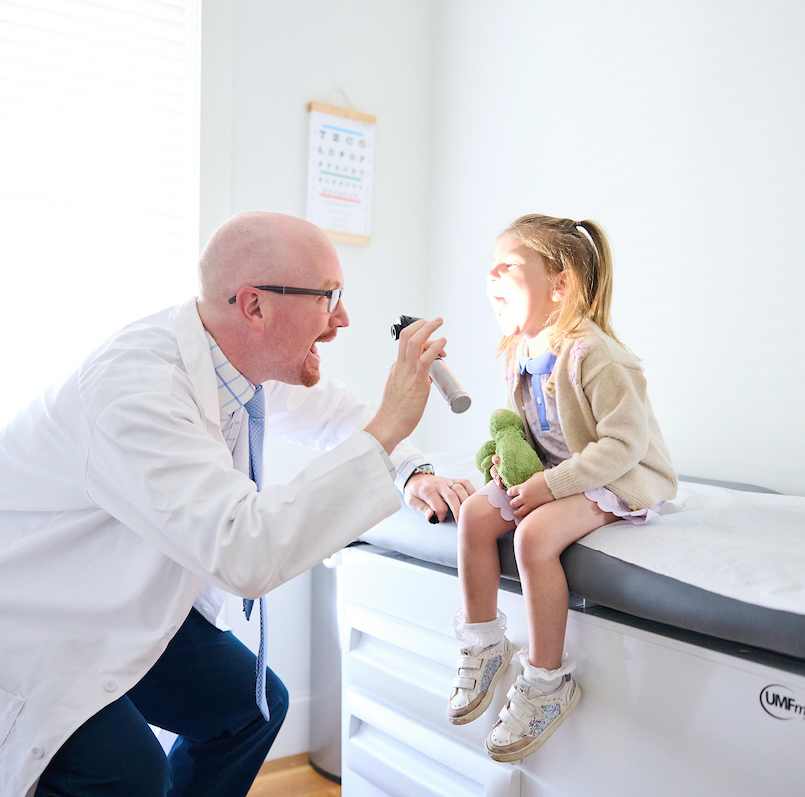 dr shane rainey with pediatric functional medicine patient